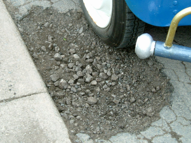 IN THE POT HOLE. 9inch depth..JPG